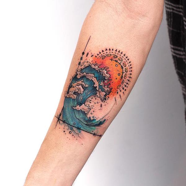 Massive wave under the sun forearm tattoo Massive wave under the sun forearm tattoo