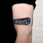 Sleeve tattoo of a miniature painting of Water Lilies