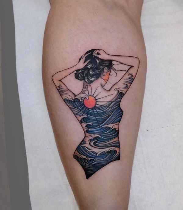 Tattooed woman with wave around her body Tattooed woman with wave around her body