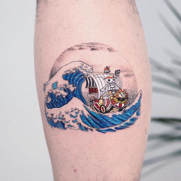 The Great Wave off Kanagawa tattoo of The Great Wave off Kanagawa and The Going Merry anime art