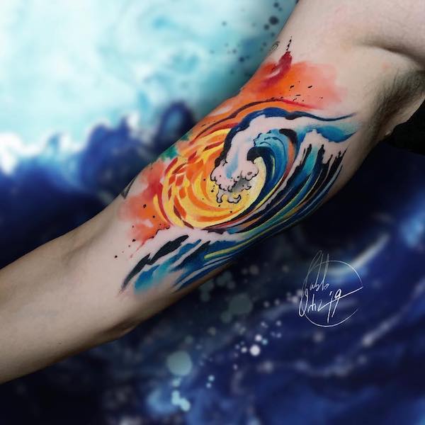 Watercolor infinity wave tattoo on the thigh