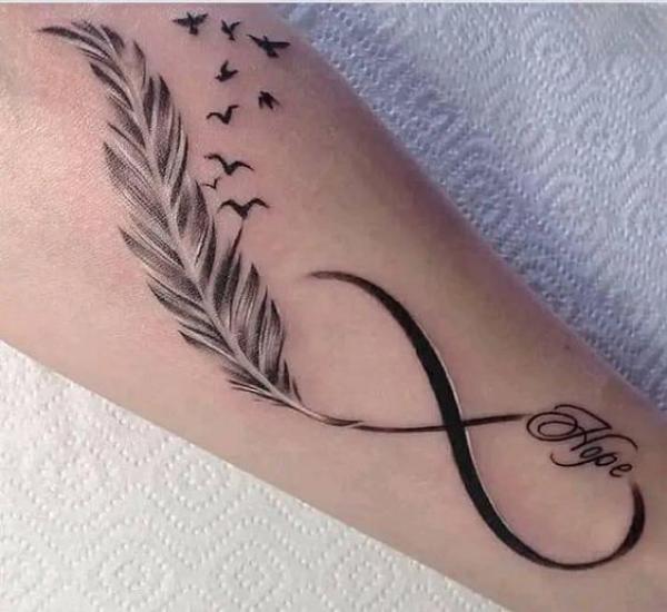 Black and white feather infinity tattoo with birds