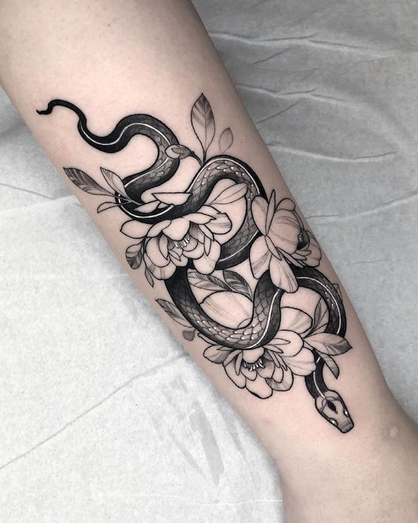 Black and white snake and flower tattoo Black and white snake and flower tattoo