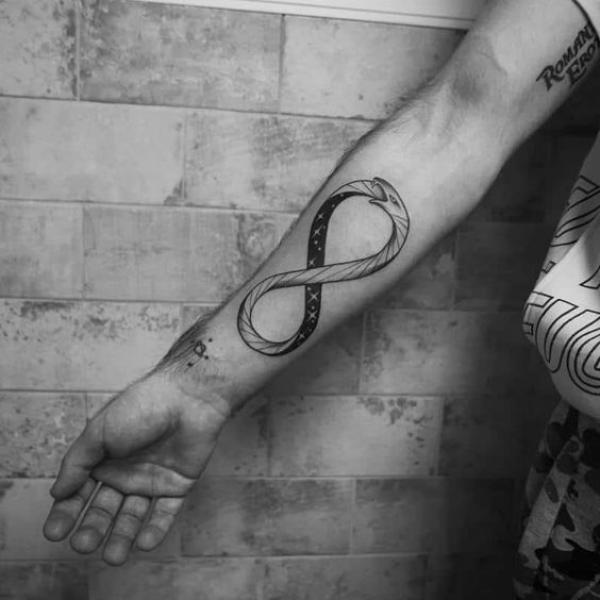 Black and white snake infinity tattoo