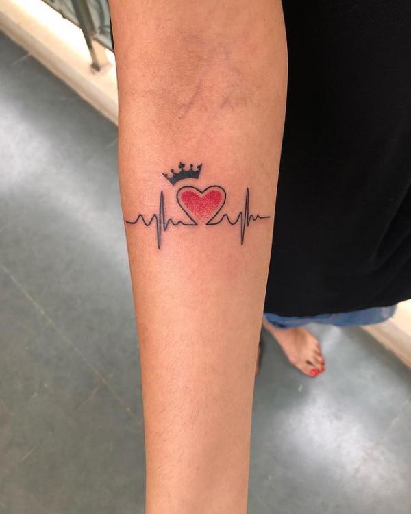 Tattoo uploaded by Nicoleta Andreea  Heartbeat on chest  bow on finger  tattoos  Tattoodo