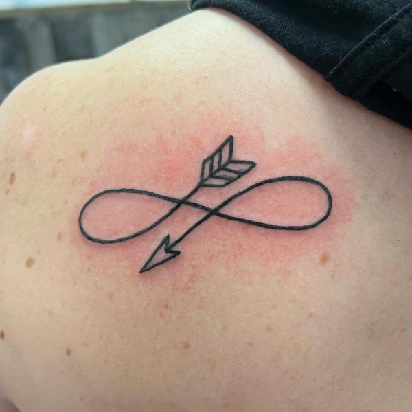 Infinity arrow back tattoo