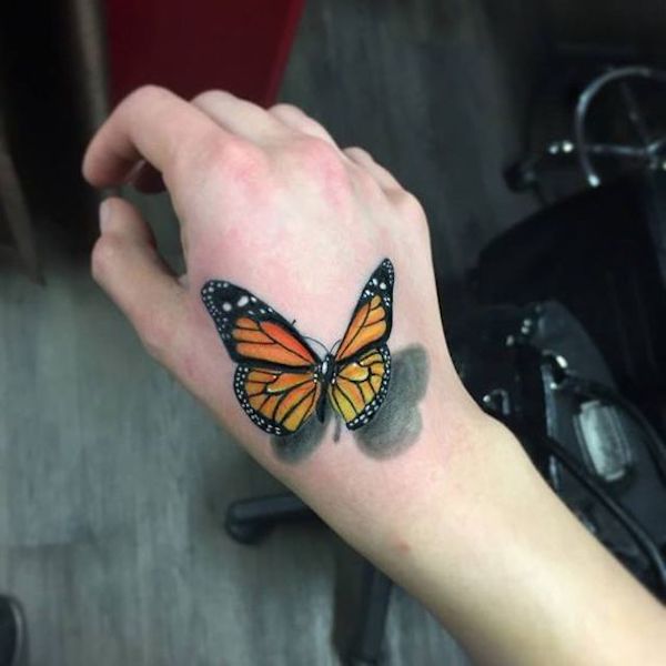 3D monarch butterfly on hand