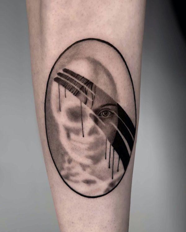 Abstract covering eye tattoo