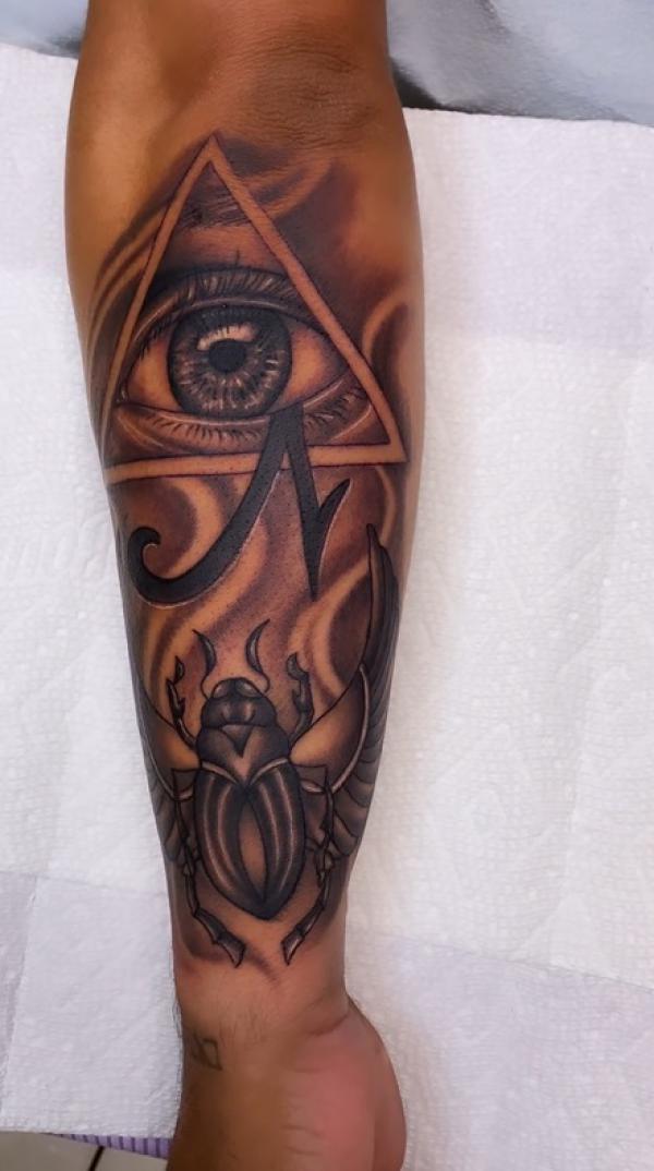 Al seeing eye and Scarab beetle tattoo