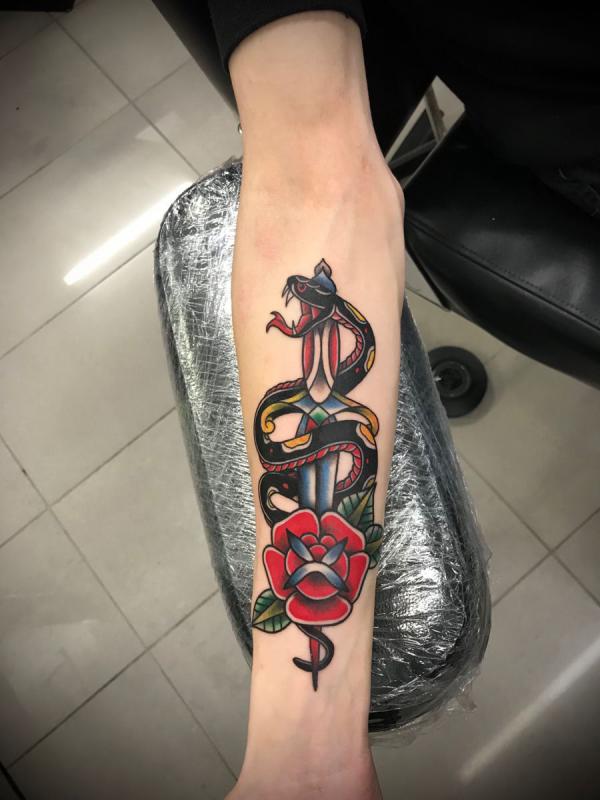 American traditional snake and dagger with rose tattoo