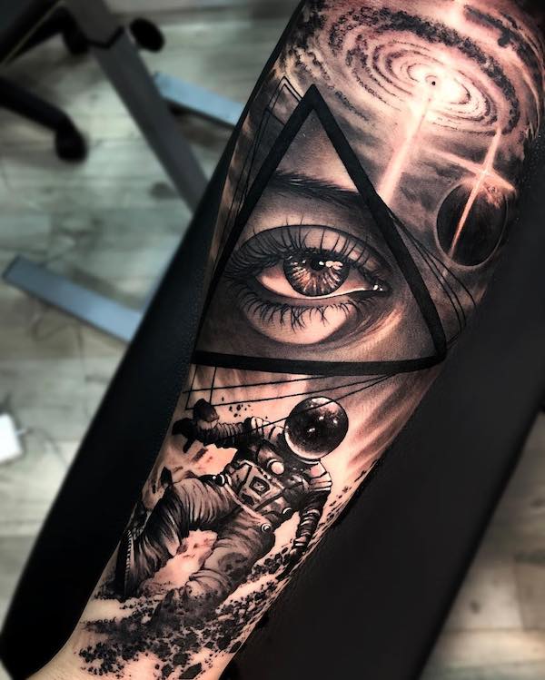 Astronaut and Eye of Providence tattoo