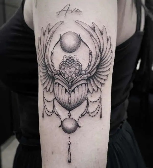 Black and grey Scarab Beetle tattoo