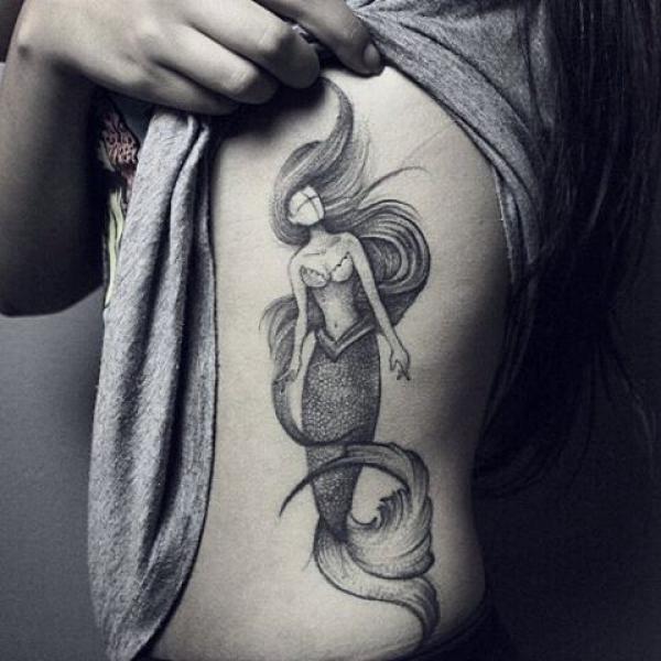 Black and grey mermaid side tattoo