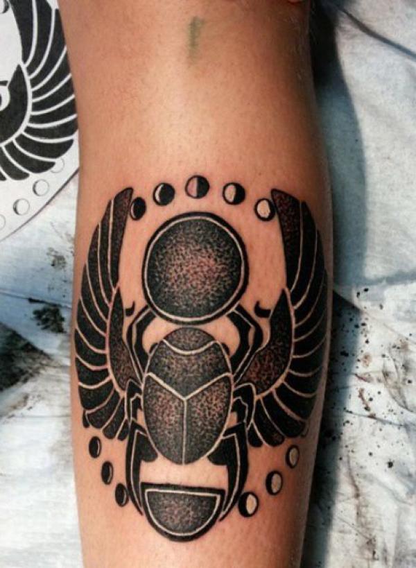 Black and white Scarab beetle and moon phase tattoo