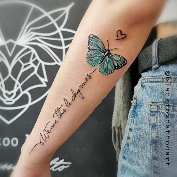 Blue butterfly forearm tattoo with Quotes - We are the lucky ones