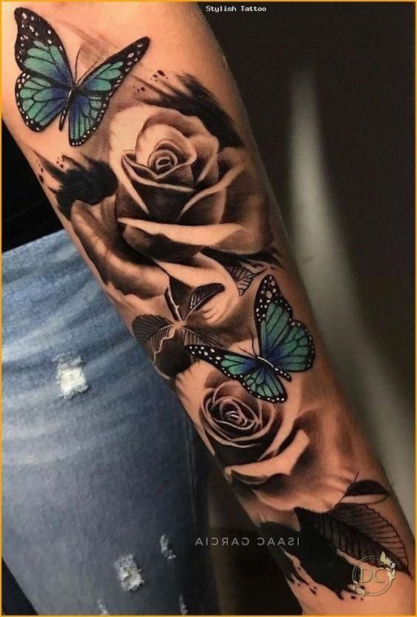Blue monarch butterfly and rose tattoo