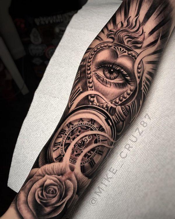 Eye tattoo on the left elbow