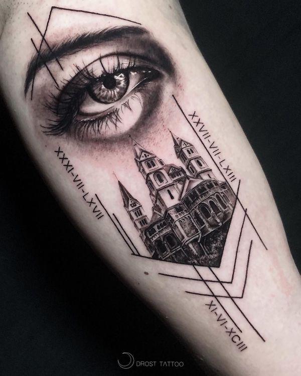 Eye and city tattoo with dates in roman numbers