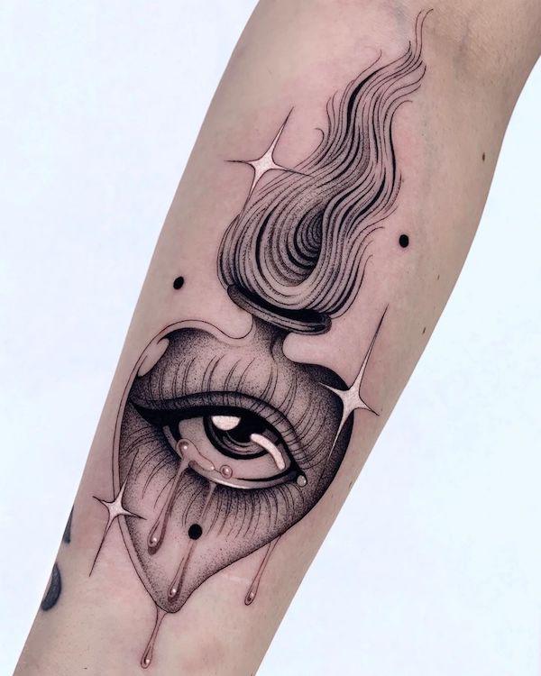 Eye and sacred heart tattoo