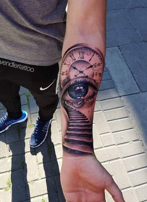 Eye with teardrop stairs and clock tattoo