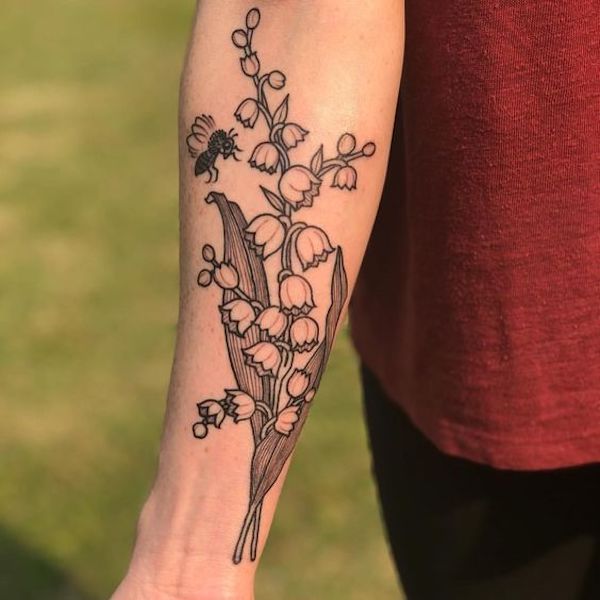 Forearm lily of the valley tattoo