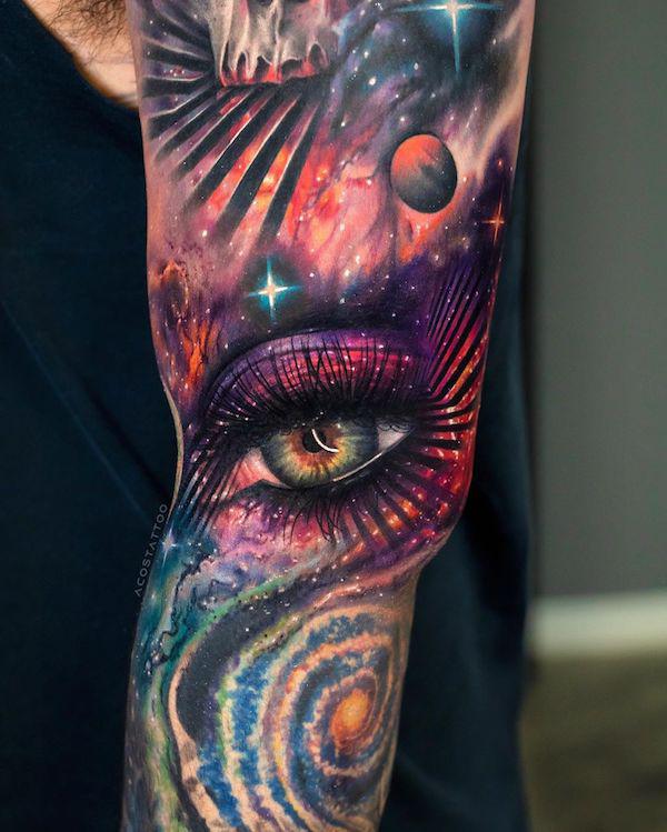 Galaxy and eye tattoo