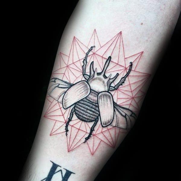 Geometric Scarab Beetle tattoo on Arm