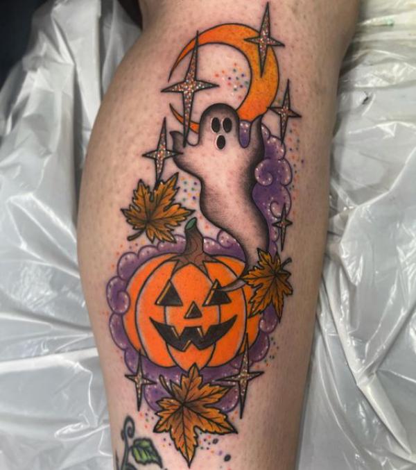 Ghost and pumpkin with moon and stars