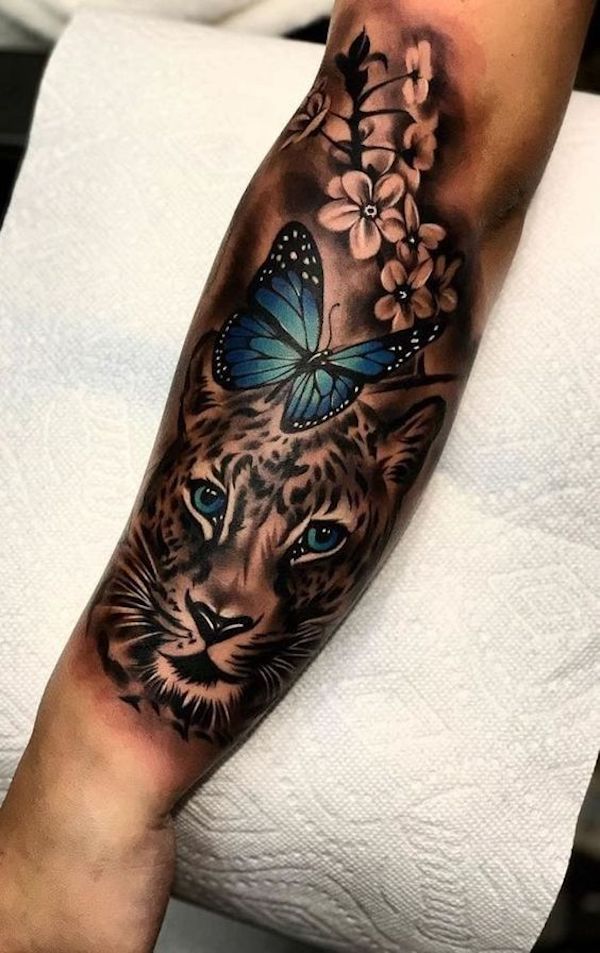 Jaguar and butterfly forearm tattoo for men