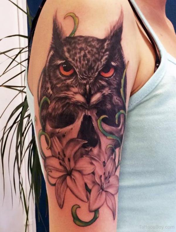 Lily flower and owl tattoo