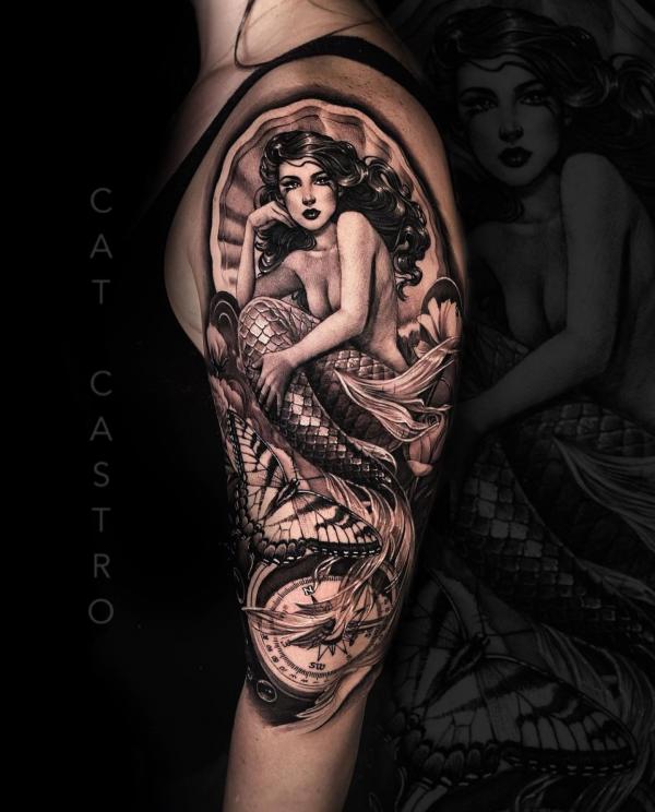 Mermaid and butterfly with compass tattoo