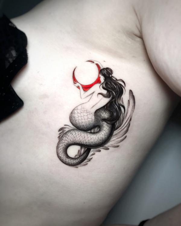 Mermaid and crescent moon tattoo
