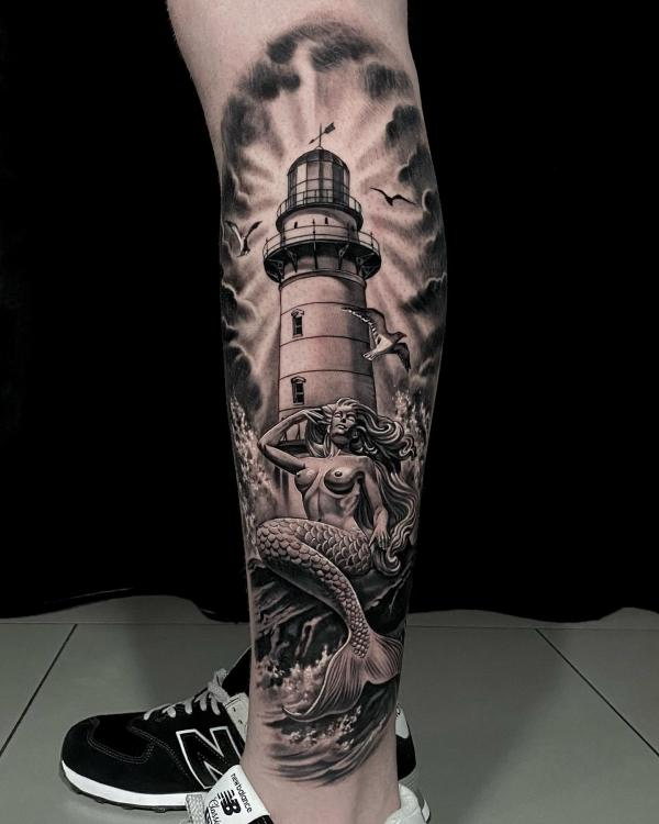 Mermaid and lighthouse tattoo