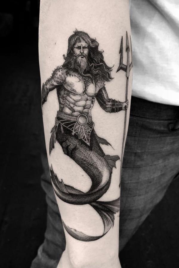 Mermaid poseidon holding his trident tattoo
