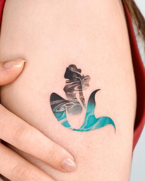 Mermaid silhouette tattoo