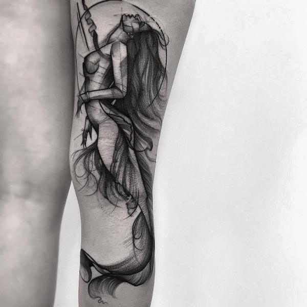 Mermaid sketch tattoo