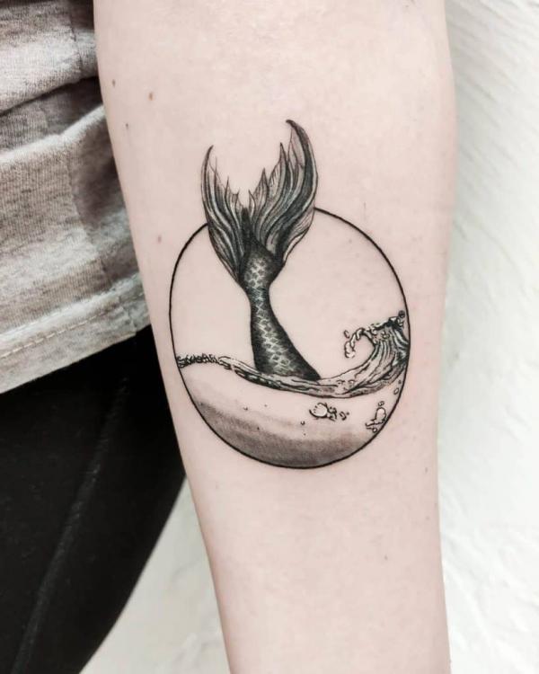 Mermaid tail tattoo