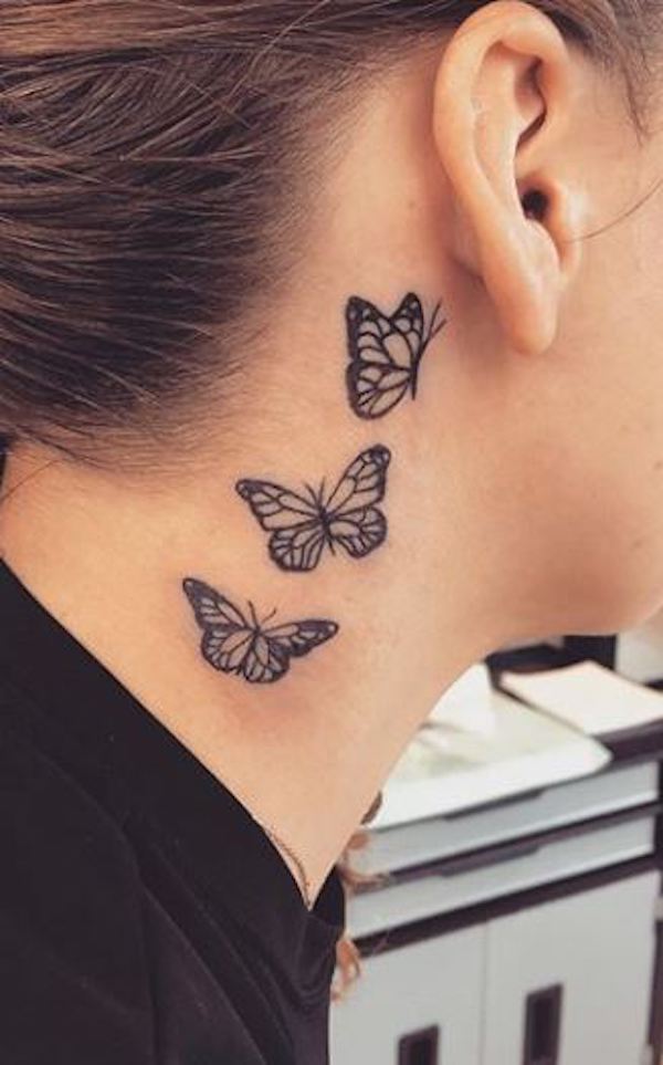 Monarch butterfly ear tattoo