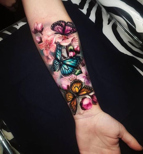 Tattoo uploaded by Rose Noir Tattoo  Beauty Studio  Stargazer lily  ladybug and butterfly  Tattoodo