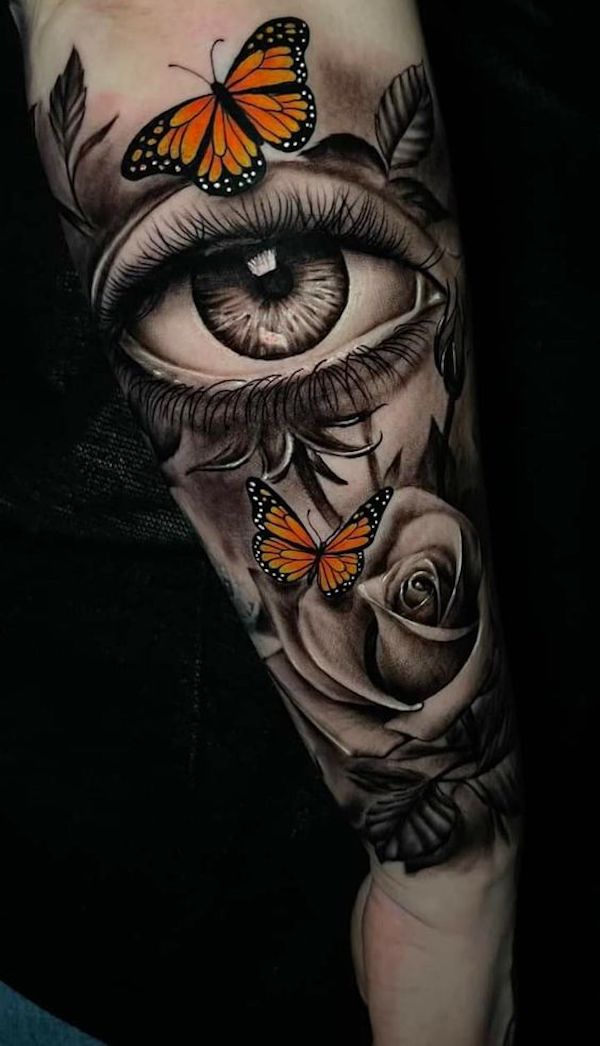 Eye of roses and - Monarch butterfly tattoo for male