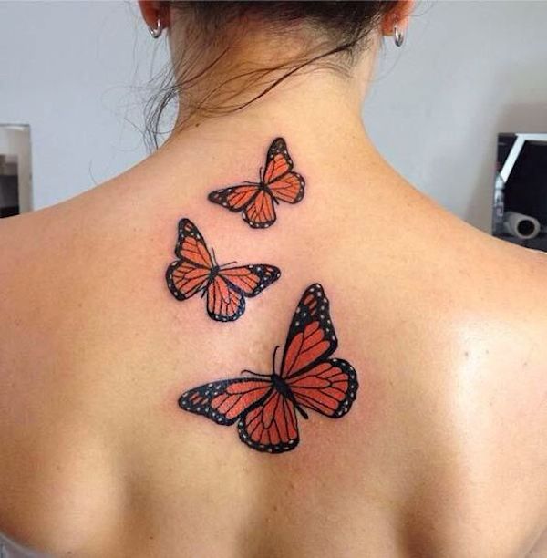 Monarch butterfly tattoo on back