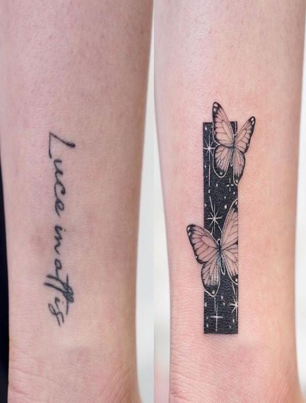 Name cover up tattoo with butterflies