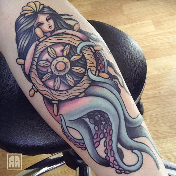 Neo traditional mermaid and wheel tattoo