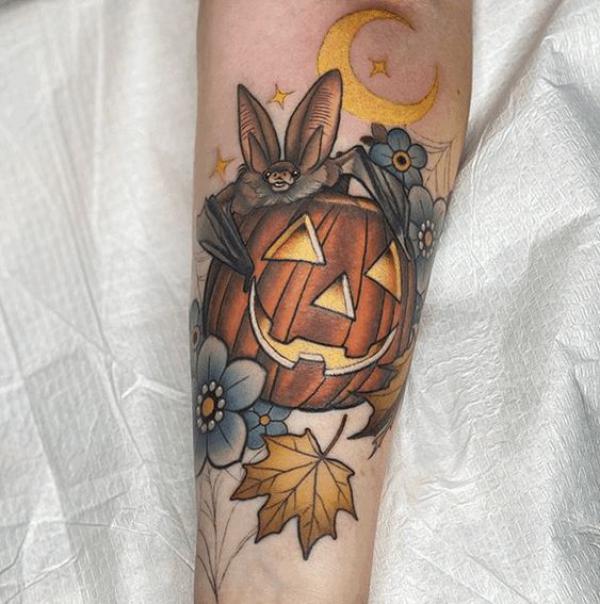 Neo traditional pumpkin and bat tattoo