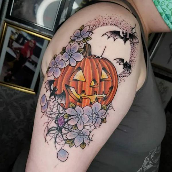 Pumpkin and flowers with bats and spider