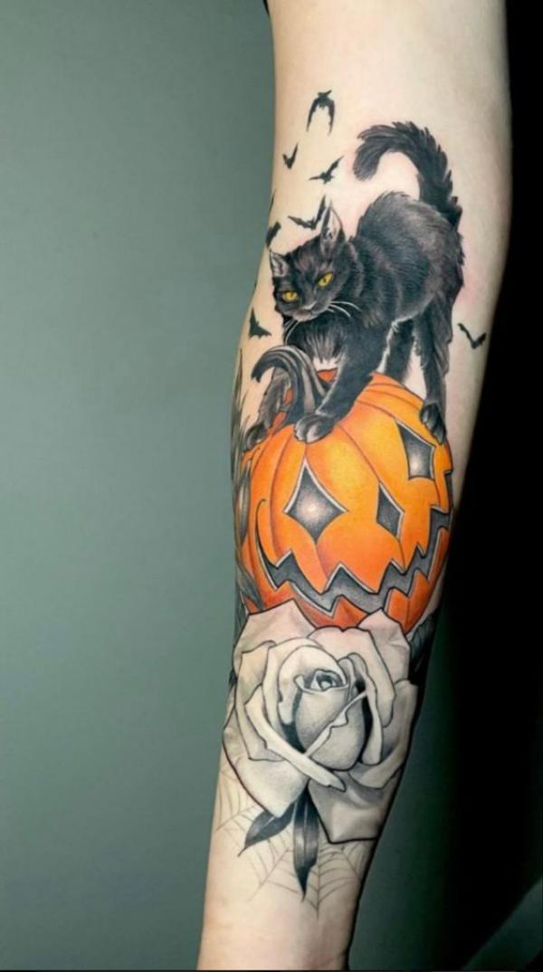 Pumpkin and white rose with a black cat tattoo