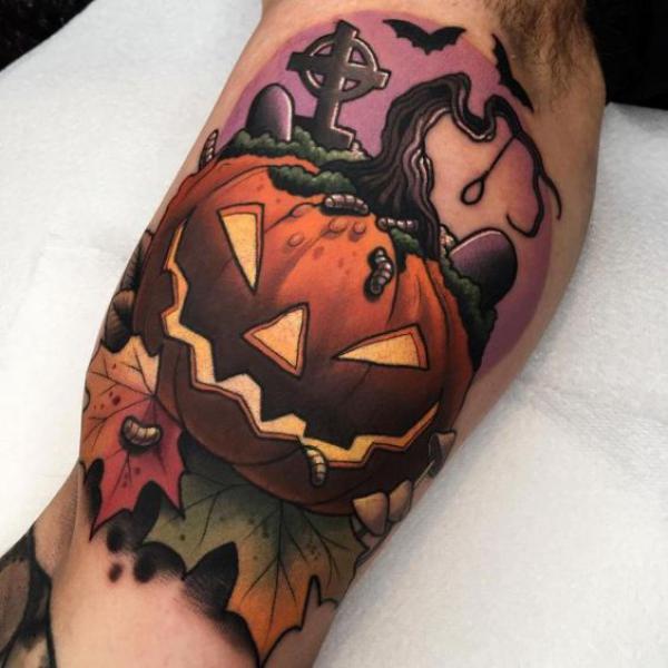 Pumpkin bicep tattoo