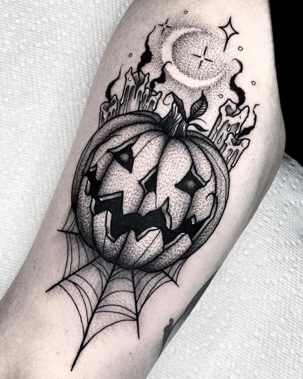 Pumpkin with moon and stars