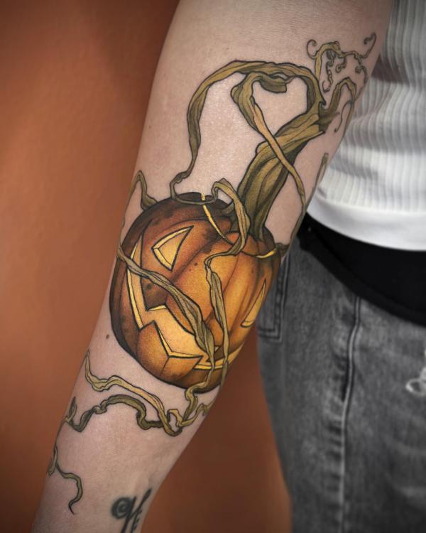 Pumpkin wrapped with vine