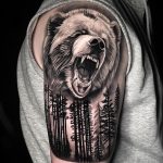 Realistic howling bear quarter sleeve tattoo